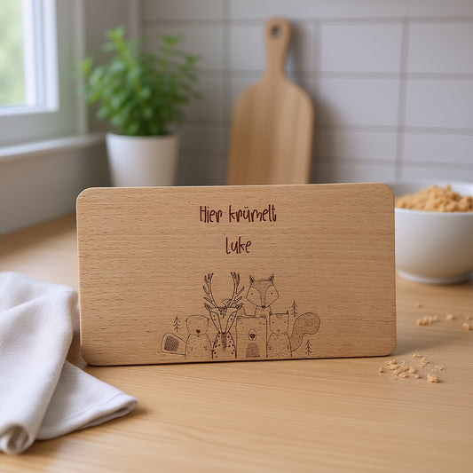 Frühstücksbrett Buchenholz "Hier krümelt mit Waldtieren..."