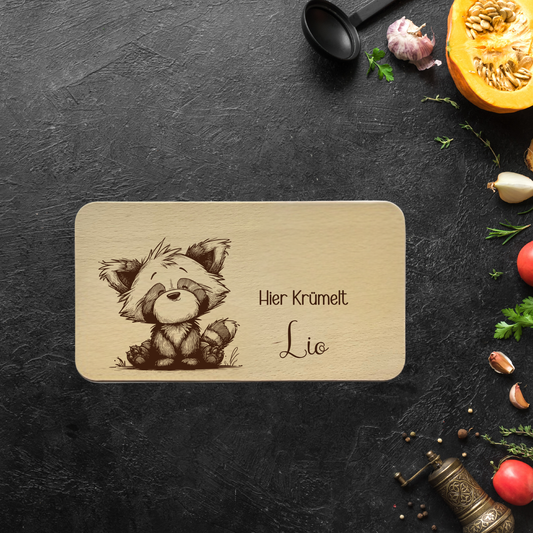 Frühstücksbrett Buchenholz "Hier krümelt…mit süßem Waschbären"