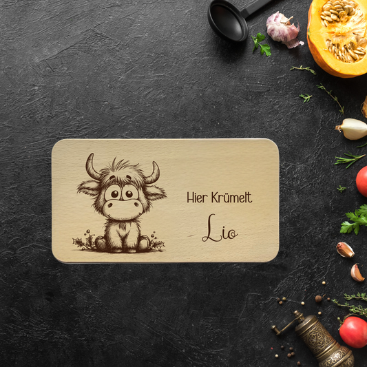Frühstücksbrett Buchenholz "Hier krümelt… mit niedlicher Kuh"