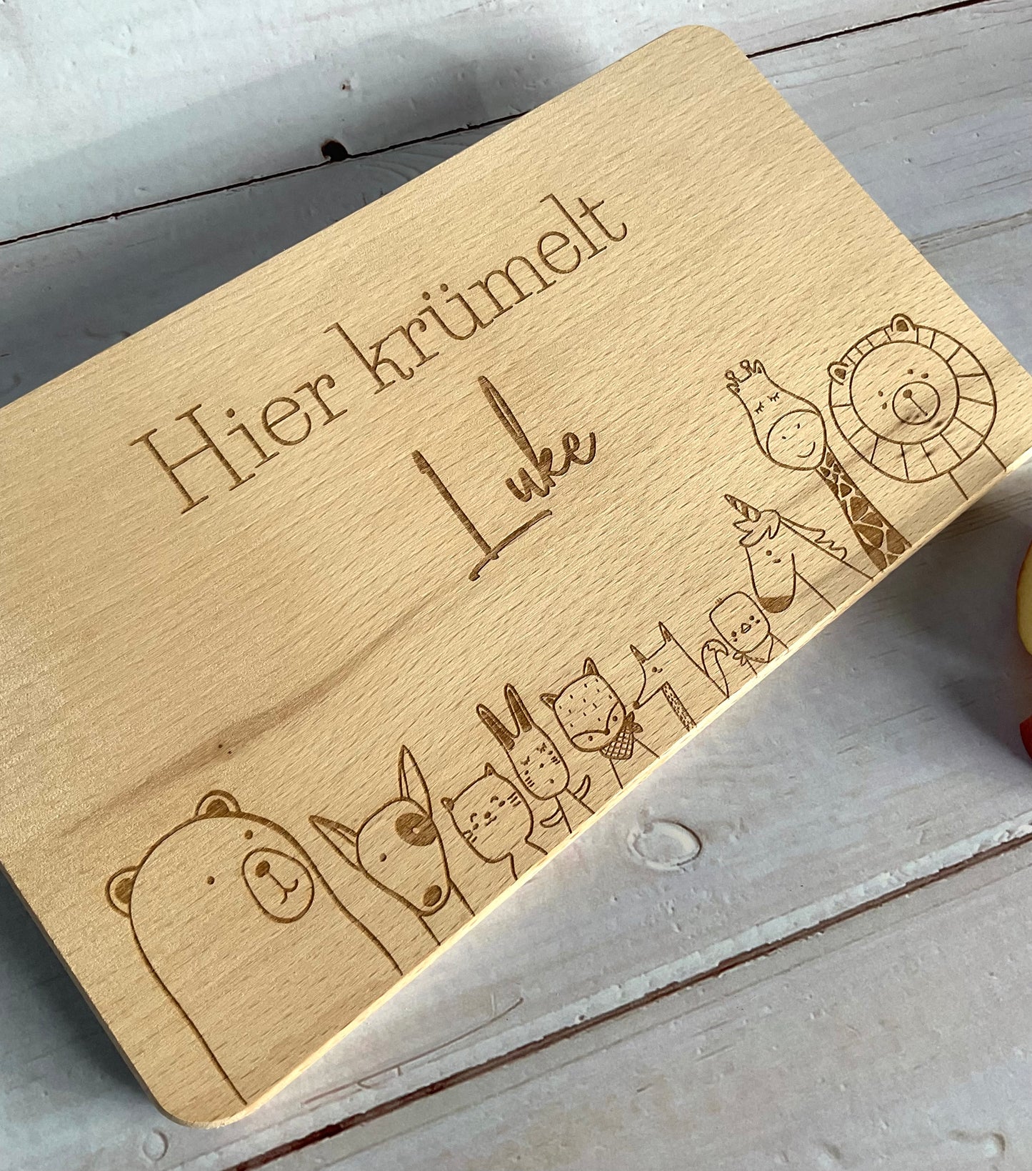 Frühstücksbrett Buchenholz "Hier krümelt..." 26x15x1,2cm Kernbuche