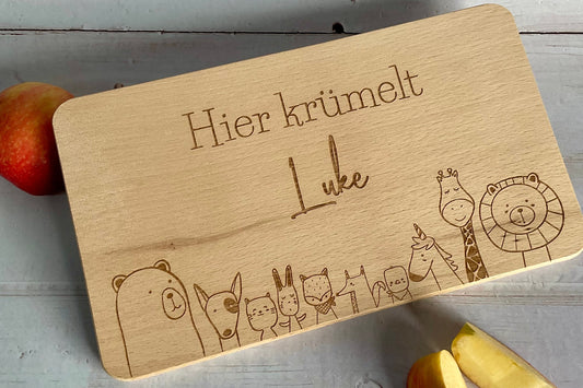 Frühstücksbrett Buchenholz "Hier krümelt..." 26x15x1,2cm Kernbuche